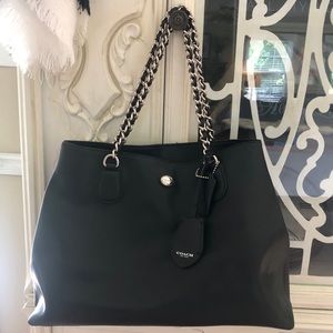COACH black tote with double metal handles